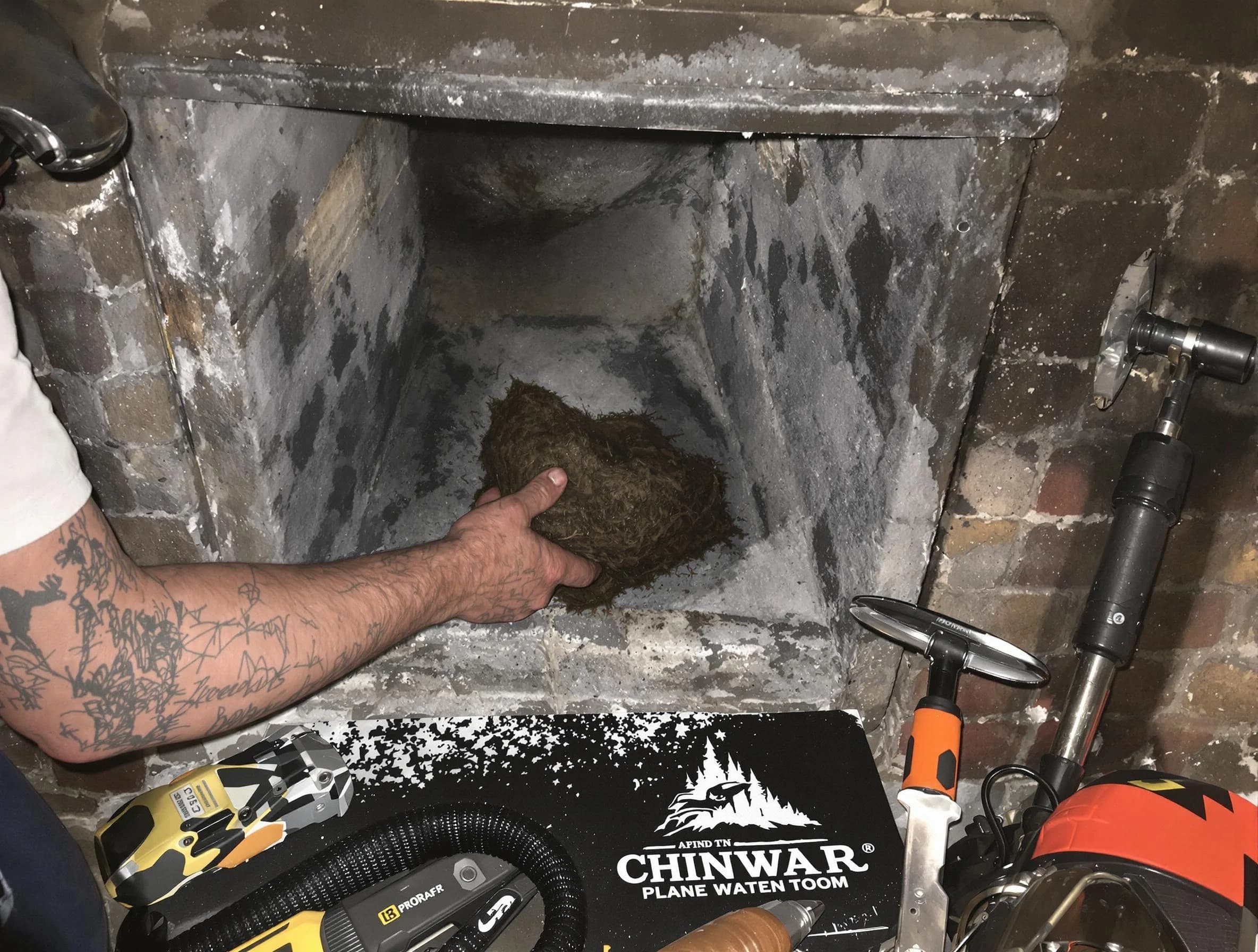 Lebanon Chimney Sweep safely removing debris and screening chimney in Lebanon, TN